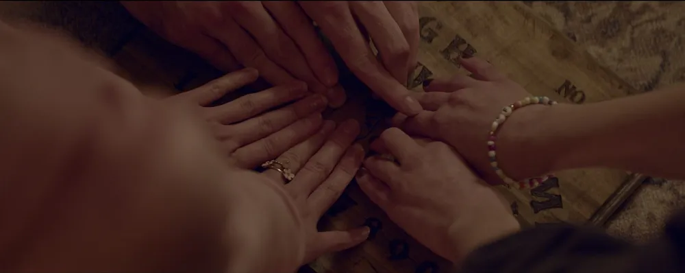 Rebecca Gruss Conjures Humanity in "Thrift Store Ouija Board"