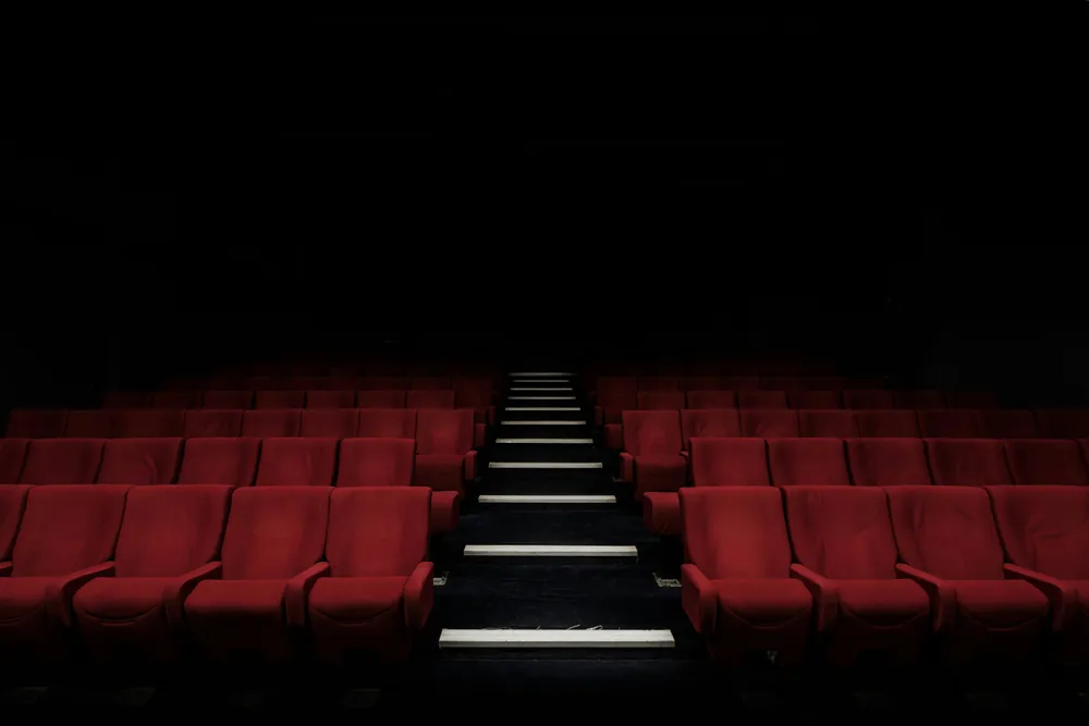 A theatre filled with empty seats.